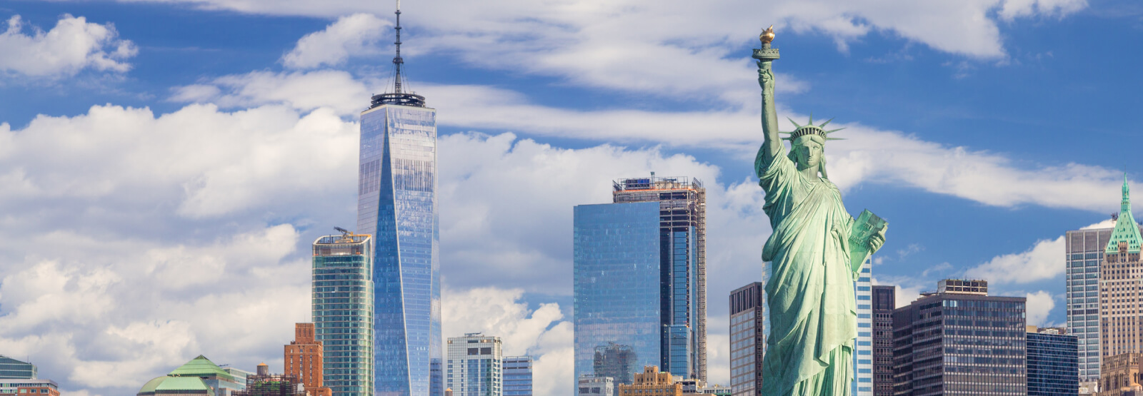 skyline with the Statue of Liberty